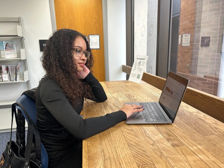 Jenaya Vann at her computer
