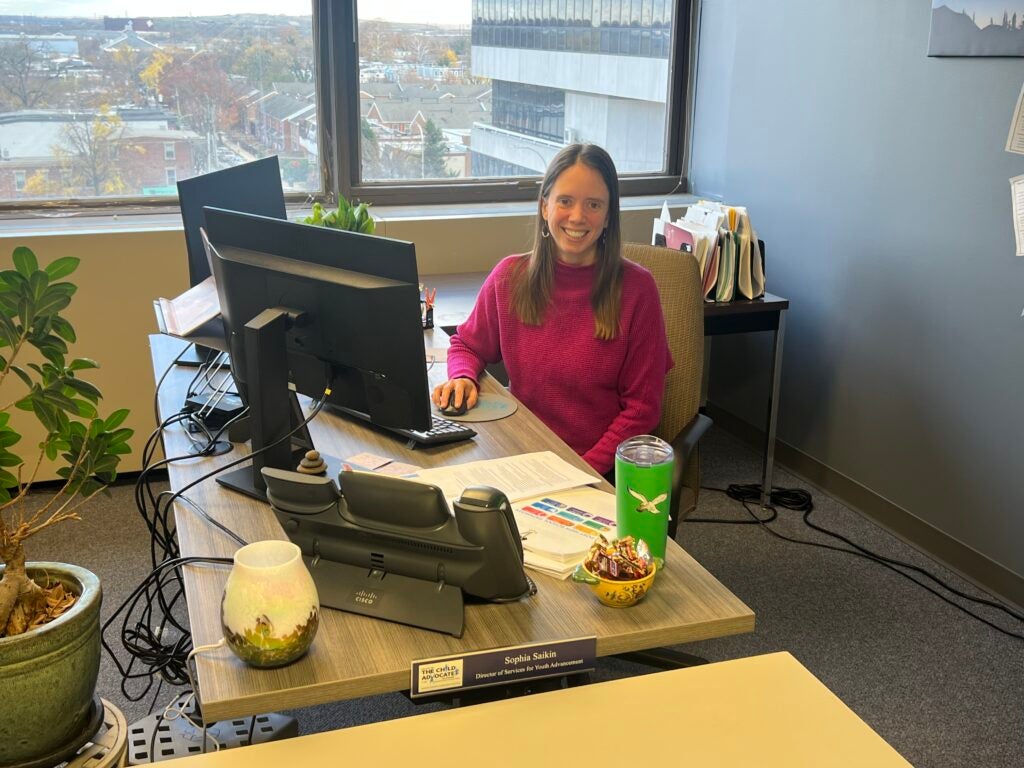 Sophia Saikin at her desk