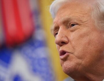 A close-up photo of Donald Trump speaking