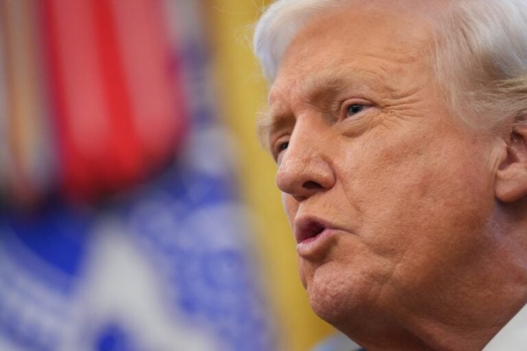 A close-up photo of Donald Trump speaking