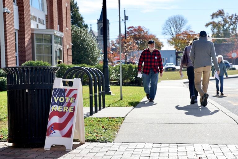 Voters come and go at the Moorestown Township Municipal Building.
