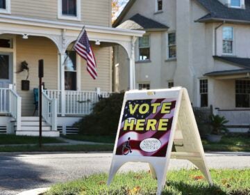 A sign outside the Moorestown Township Fire Station on Main Street identifies it as a polling place.
