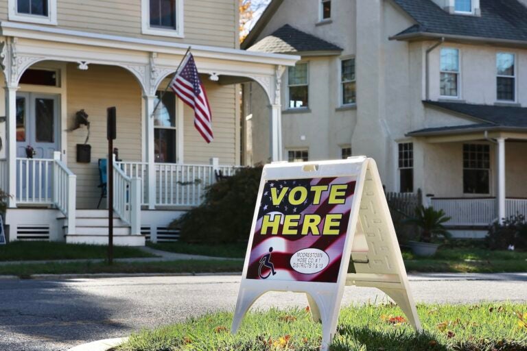 A sign outside the Moorestown Township Fire Station on Main Street identifies it as a polling place.