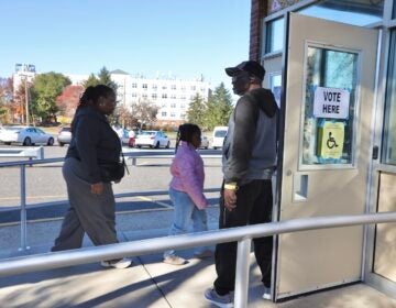 election-day-willingboro-new-jersey-polling-place-voters-EL-01-110425 Voters arrive at Stuart Elementary School, a polling place in Willingboro, New Jersey.