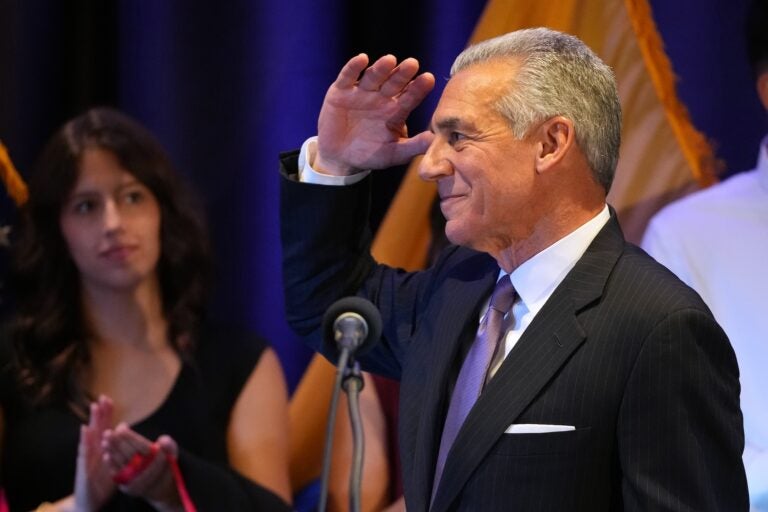 Jack Ciattarelli saluting to the crowd at his election night party