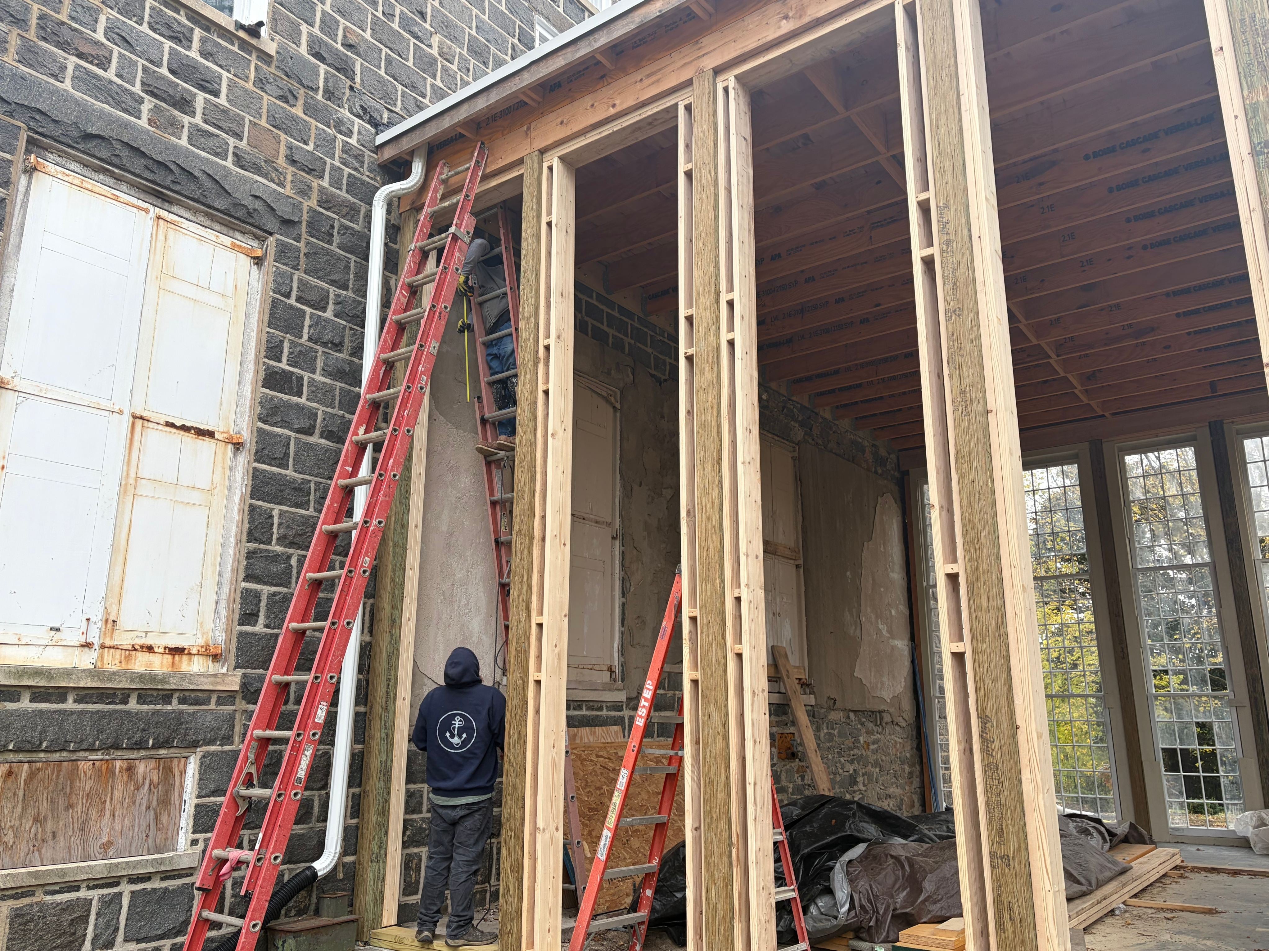 workers rebuilding the conservatory at the Gibraltar home