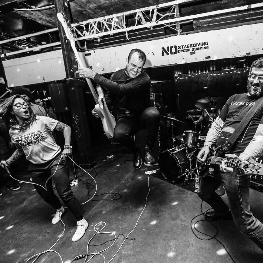 The band Open City performing