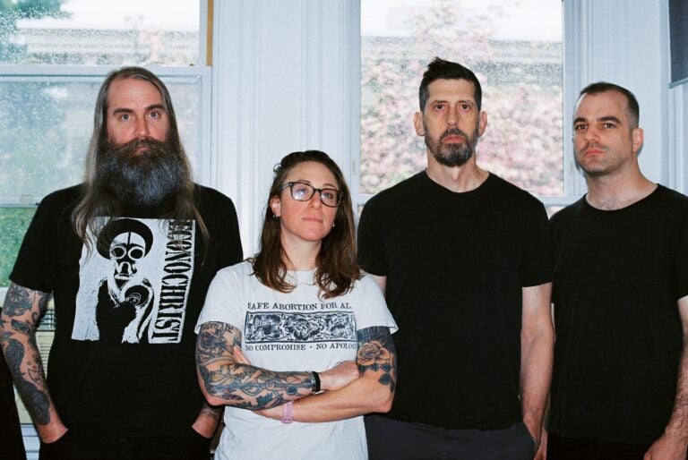 The band Open City looks on