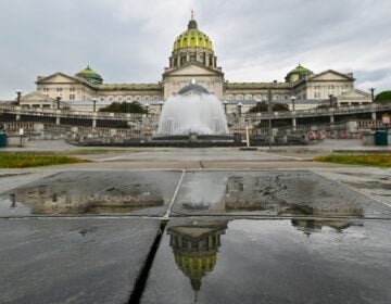 Pennsylvania Budget The Pennsylvania State Capitol is reflected on the ground
