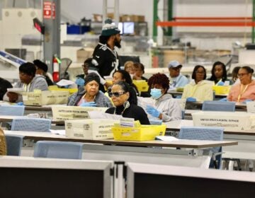Election workers prepare ballots for scanning at the City of Philadelphia Election Warehouse in North Philadelphia.