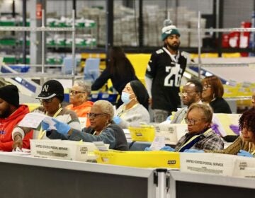 philadelphia-election-day-headquarters-mail-ballots-EL-110425-04 Election workers prepare ballots for scanning at the City of Philadelphia Election Warehouse in North Philadelphia.
