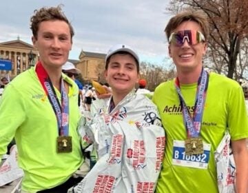 philadelphia-marathon-runners-2025-NK-112725 Sebastian Gomez (center), with Philly Achilles' Chris Aiello (right) and Johnny Fitton, after completing Sunday's 2025 Philadelphia Marathon in less than 3 hours, 30 minutes. (Courtesy of Katie Curran)