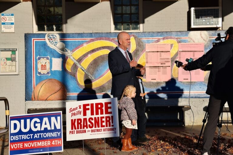 Philadelphia district attorney candidate Patrick Dugan speaks with media after casting his ballot at Corporal Jimmy O'Connor Memorial Recreation Center. He is accompanied by his grandchildren, Mason, 9, and Amelia, 3