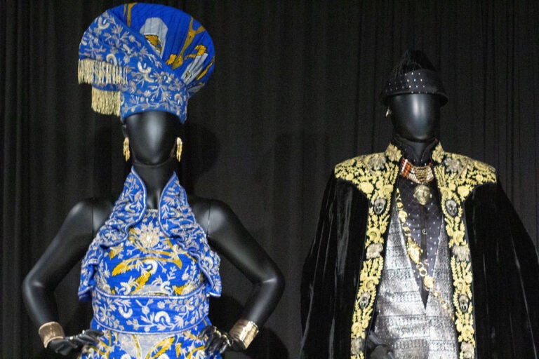 two costumes Ruth Carter worked on on display