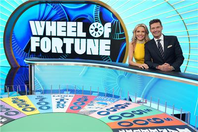 Wheel of Fortune hosts Vanna White and Ryan Seacrest on the set of the show