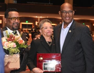 Three people posing for a photo