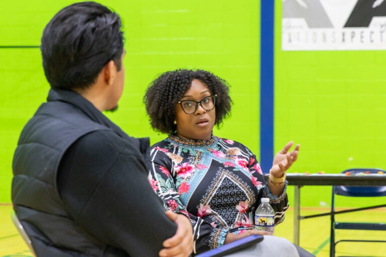 Stacey Chamburger and Johnny Perez-Gonzalez speaking at the resource fair