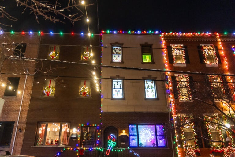 Homes decorated as part of the Miracle on South 13th Street light display in South Philadelphia