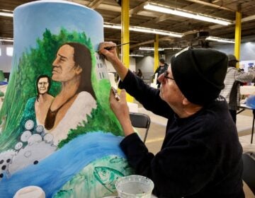 2025 12 09-e lee-bob dix-philadelphia widener memorial school-ring it on Bob Dix painting a bell