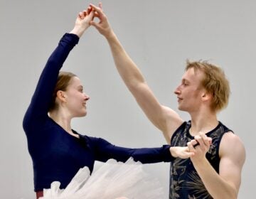 Two ballet dancers rehearsing in the dance studio