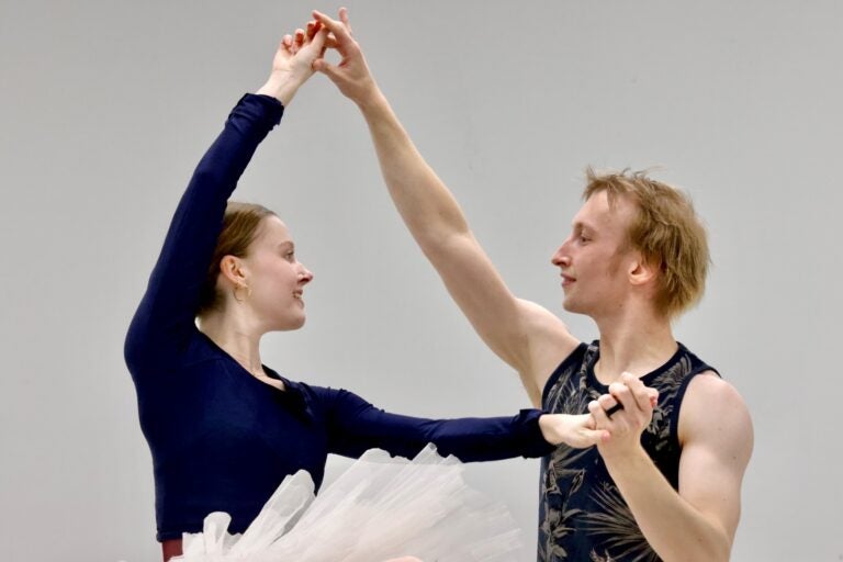 Two ballet dancers rehearsing in the dance studio