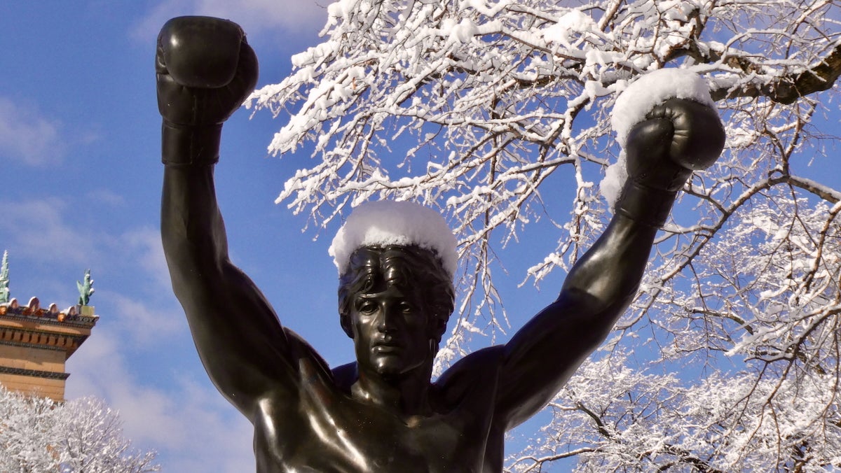 The statue of Rocky Balboa which sits in front of the Philadelphia Museum of Art is covered in a little snow after a winter storm.