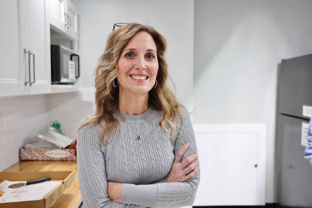 Tara Belford posing for a photo in the kitchen