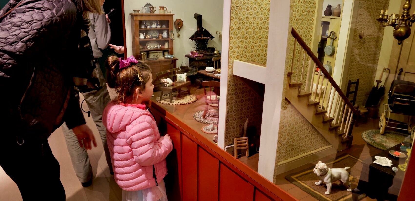 Visitors to the Brandywine Museum check out the Ann Wyeth McCoy dollhouse from 1966