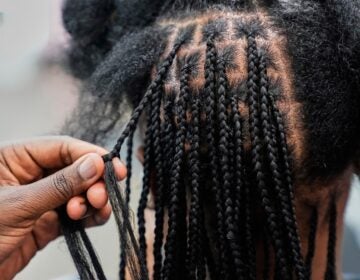 braided hair being styled