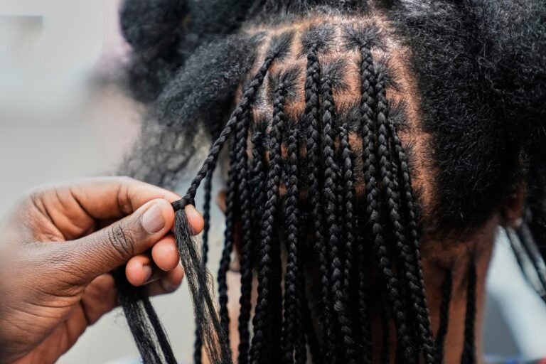 braided hair being styled
