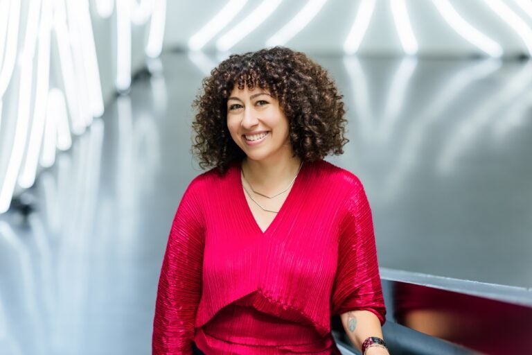 Christina Vassallo looks on