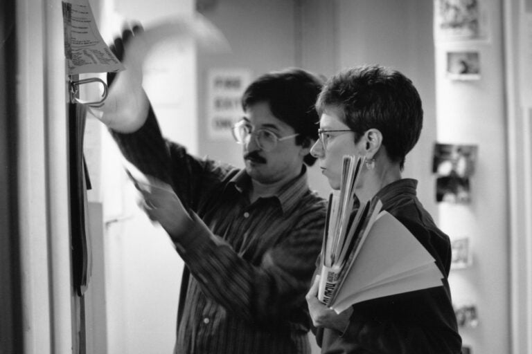 Danny Miller and Terry Gross look over the schedule