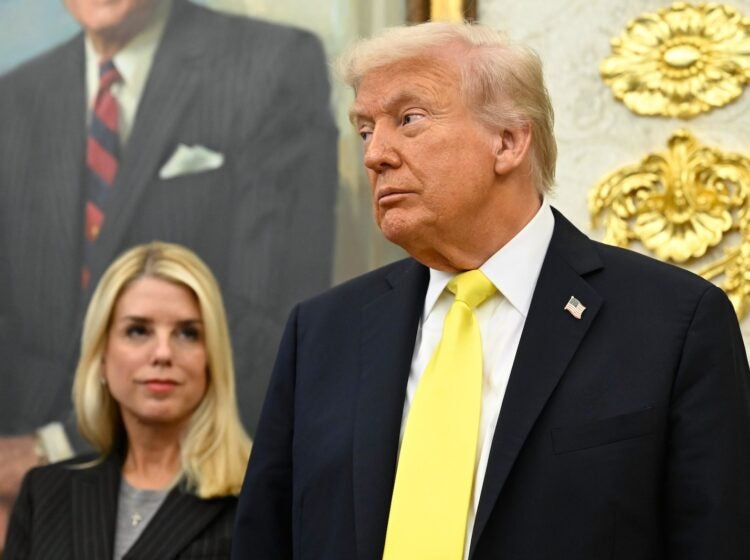 President Donald Trump and Attorney General Pam Bondi listen as FBI Director Kash Patel speaks during an event in the Oval Office at the White House, Oct. 15, 2025, in Washington.