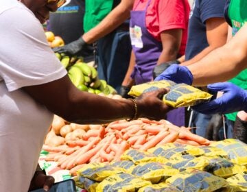 food-bank-of-south-jersey-1 volunteers handing out food