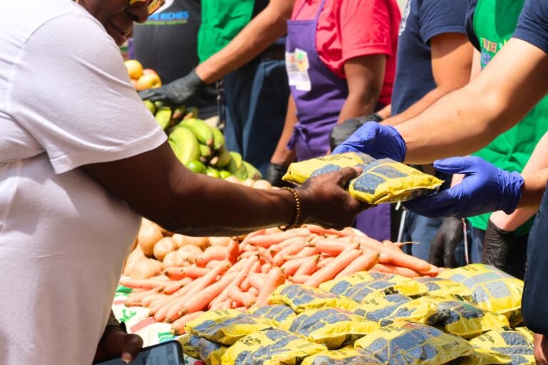 volunteers handing out food