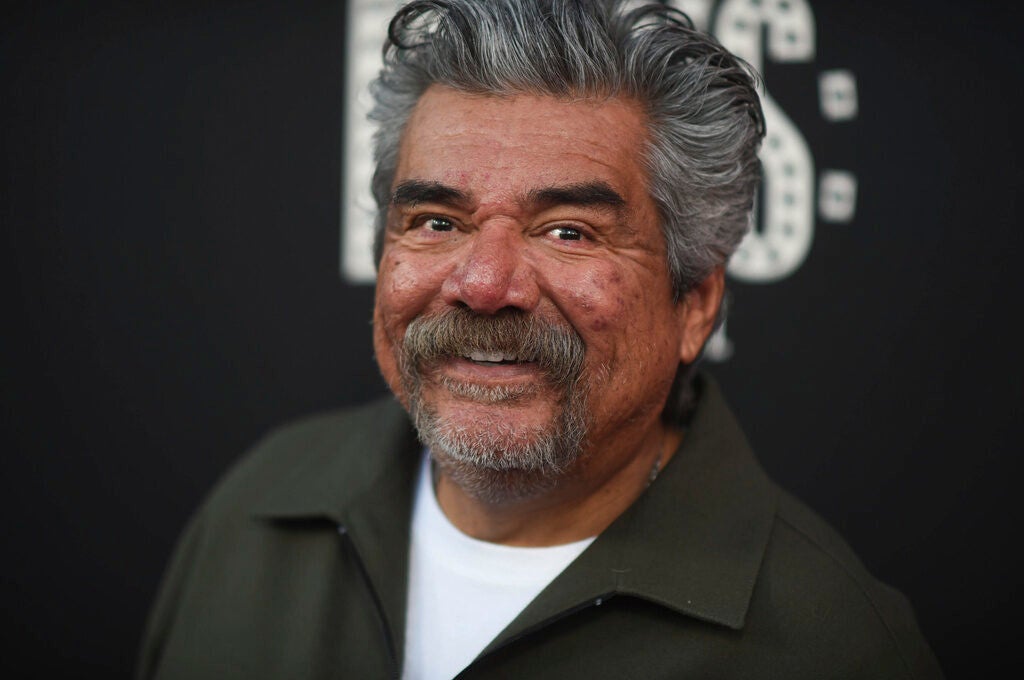 George Lopez smiles at the camera