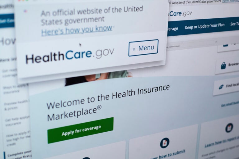 Pages from the U.S. Affordable Care Act health insurance website healthcare.gov are seen on a computer screen