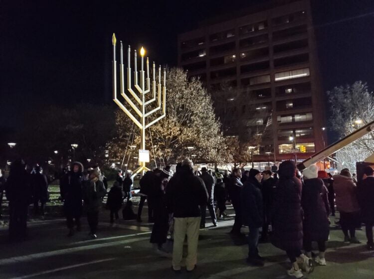 A crowd gathers for the public lighting of the menorah