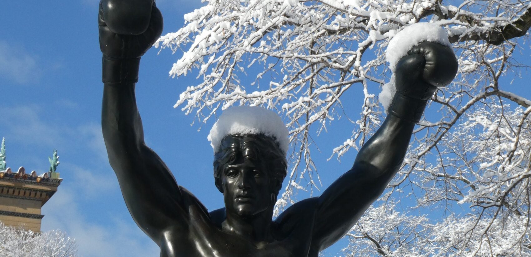 The Rocky statue covered in snow