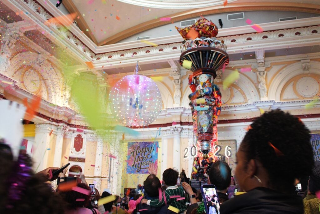 A crowd celebrates a new year's countdown at the Please Touch Museum in Philadelphia