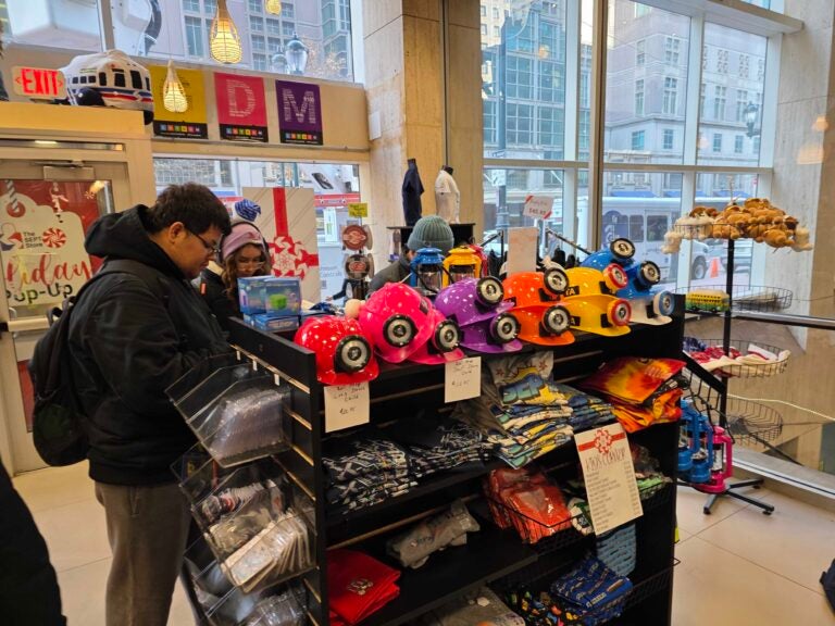 Customers look at items inside the SEPTA store in Philadelphia
