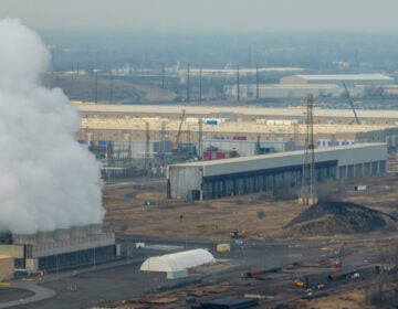01 06 2026 k paynter keystone trade industrial development falls township date center-4 An aerial view of smoke rising from an industrial factory site in a rural area of Falls Township, Pa.