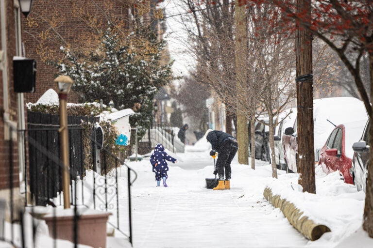 Fishtown residents work to clear snow on Jan. 25, 2025.