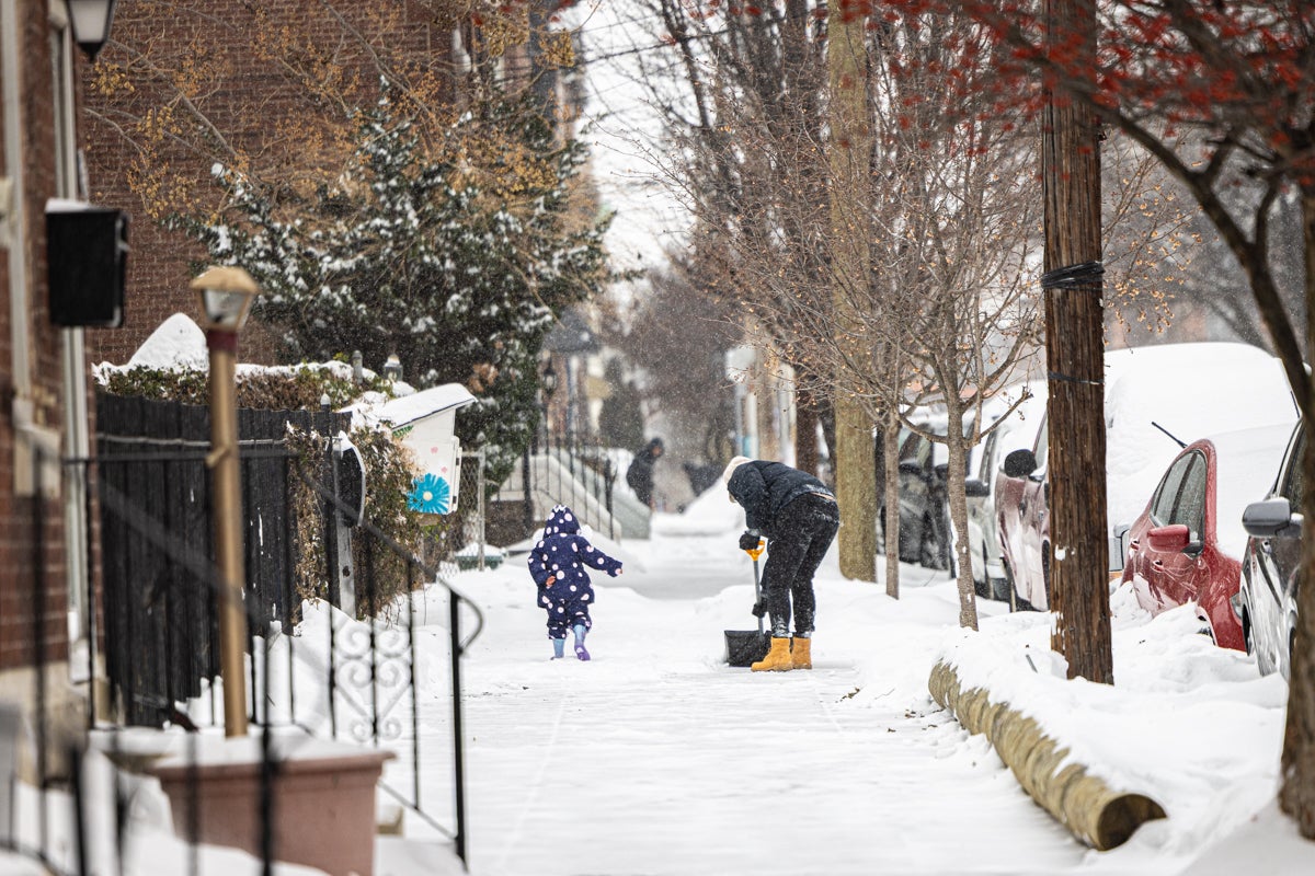 Fishtown residents work to clear snow on Jan. 25, 2025.