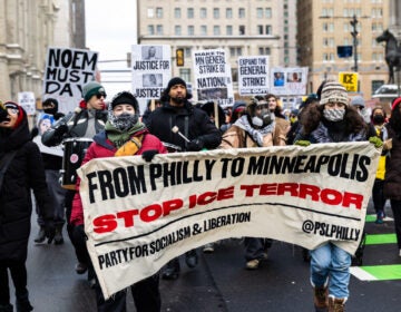 01 26 2026 k paynter psl ice protest-philadelphia-9 Protesters outside City Hall hold a banner reading FROM PHILLY TO MINNEAPOLIS STOP ICE TERROR