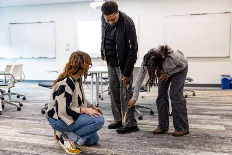 magnetic and snap closure seams on pants being shown off