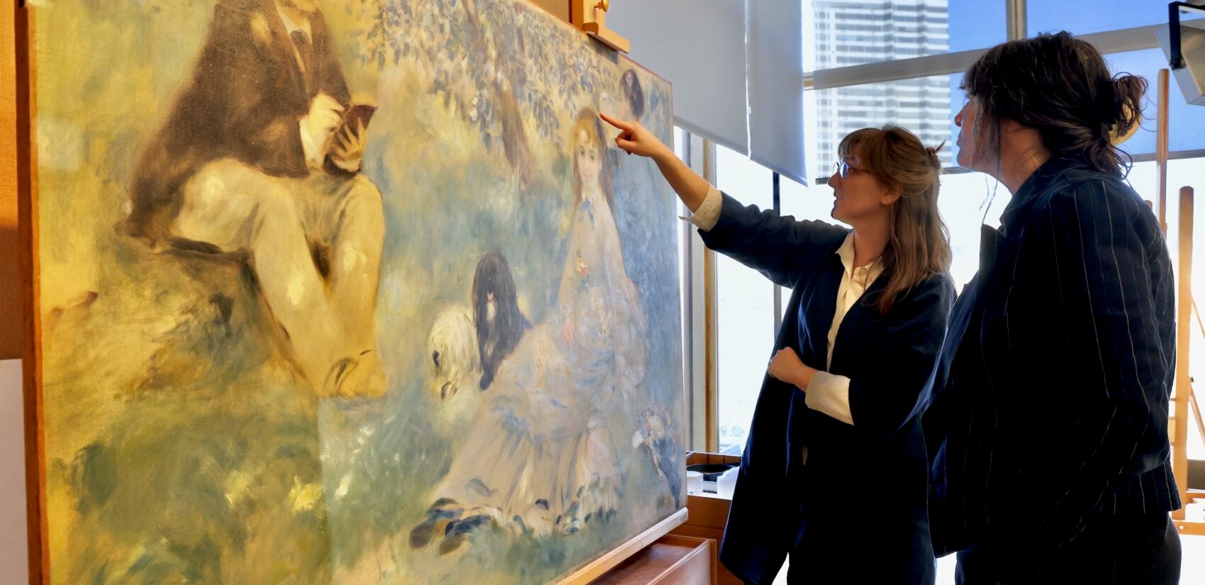 Christie Romano, associate conservator of paintings at The Barnes Foundation, shares the discoveries made during the conservation of Pierre-Auguste Renoir's ''The Henriot Family'' with Deputy Director for Research, Interpretation and Education Martha Lucy.