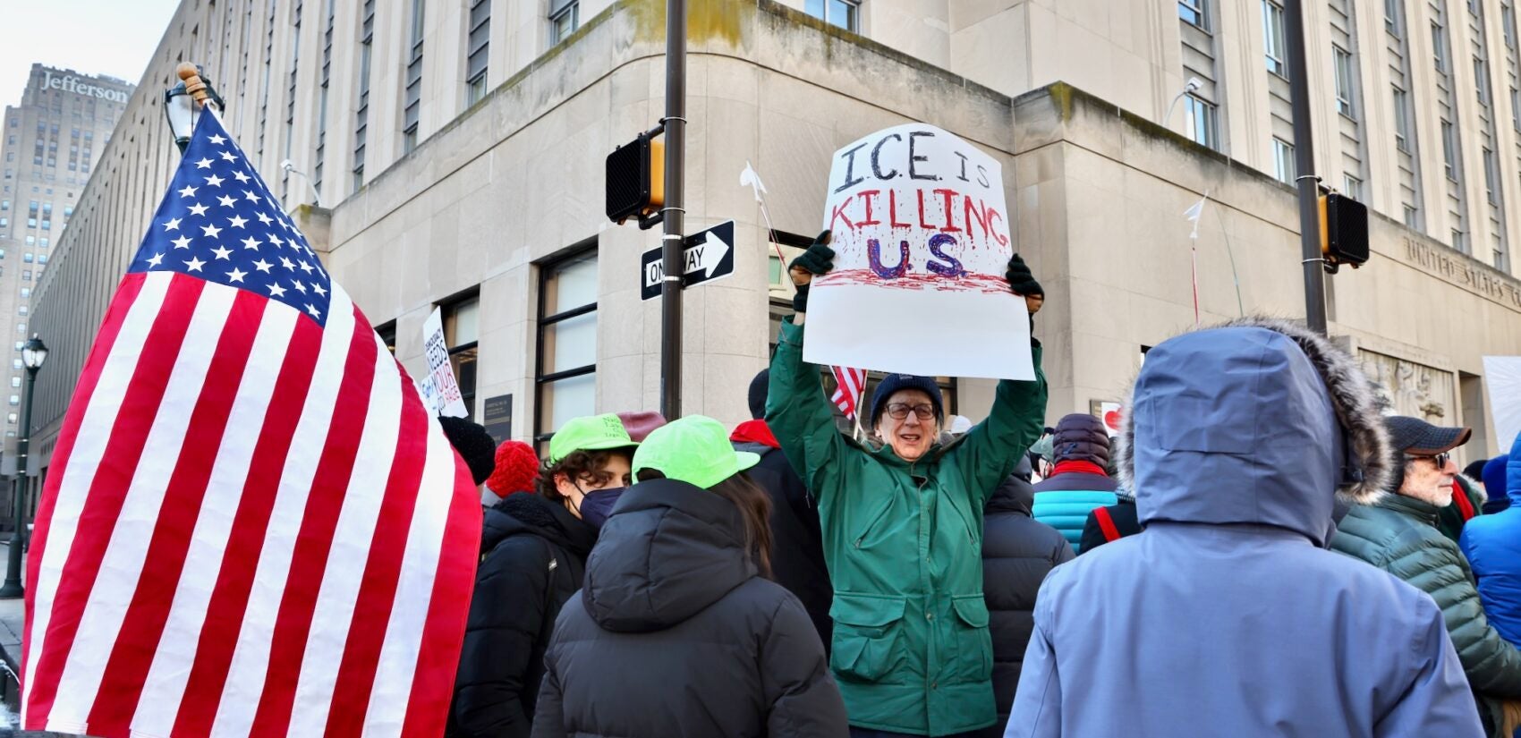 Protesters sing and chant outside the Philadelphia Immigration Court at 9th and Market streets