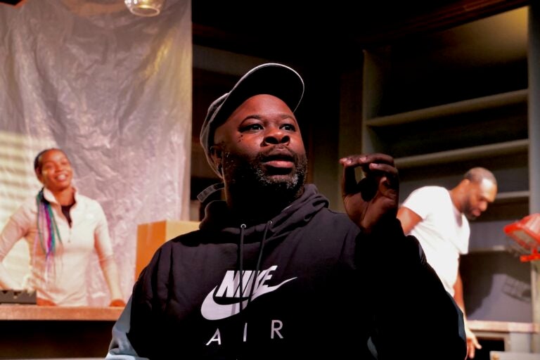 Akeem Davis speaking at Good Bones rehearsal