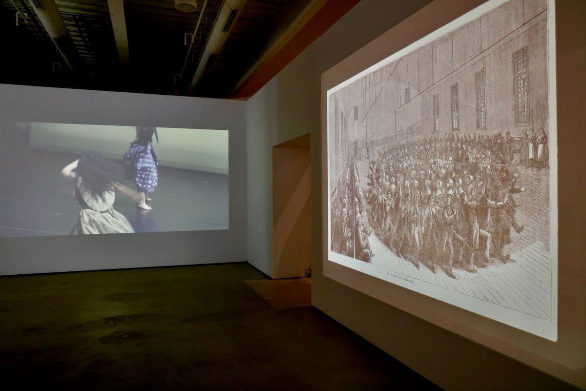 Footage of a 2022 performance of Reggie Wilson's ''Power' on display